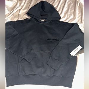 Essentials Hoodie color black.